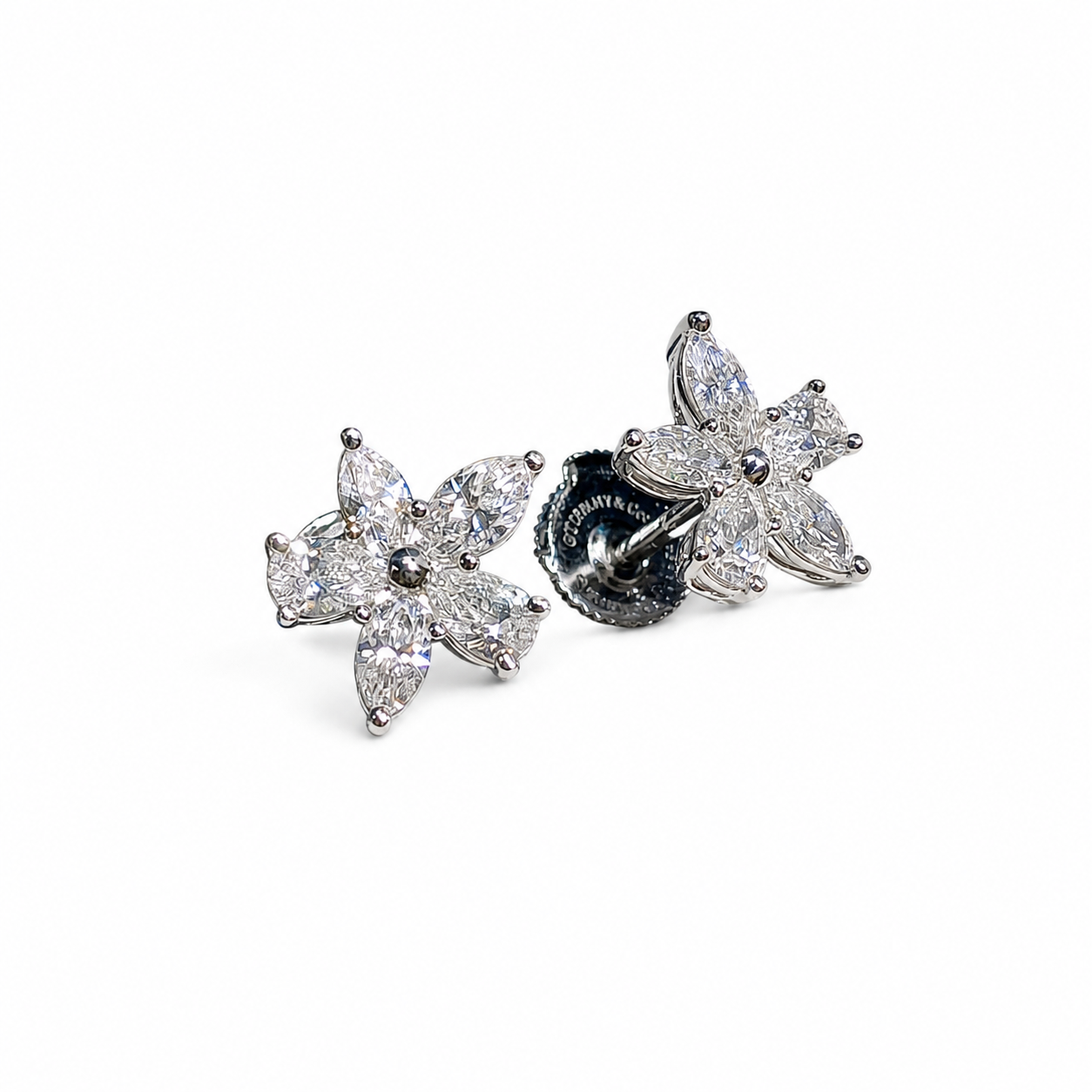 Tiffany & Co. Tiffany Victoria Mixed Cluster diamond earrings in platinum on a white background