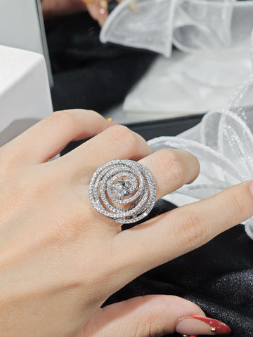 CHANEL oval diamond spiral ring shown on hand for scale