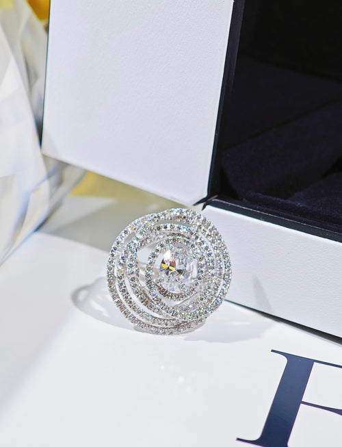 Front view of the CHANEL oval diamond spiral ring
