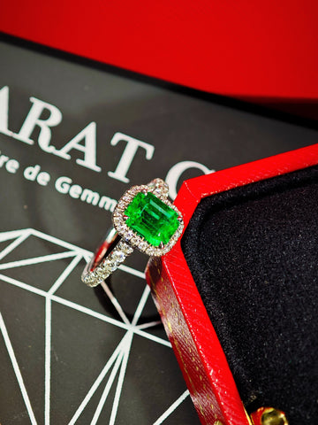 Cartier Destinée emerald solitaire ring elevated view