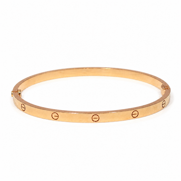 Cartier LOVE Bracelet, Small Model in 18K rose gold on a white background