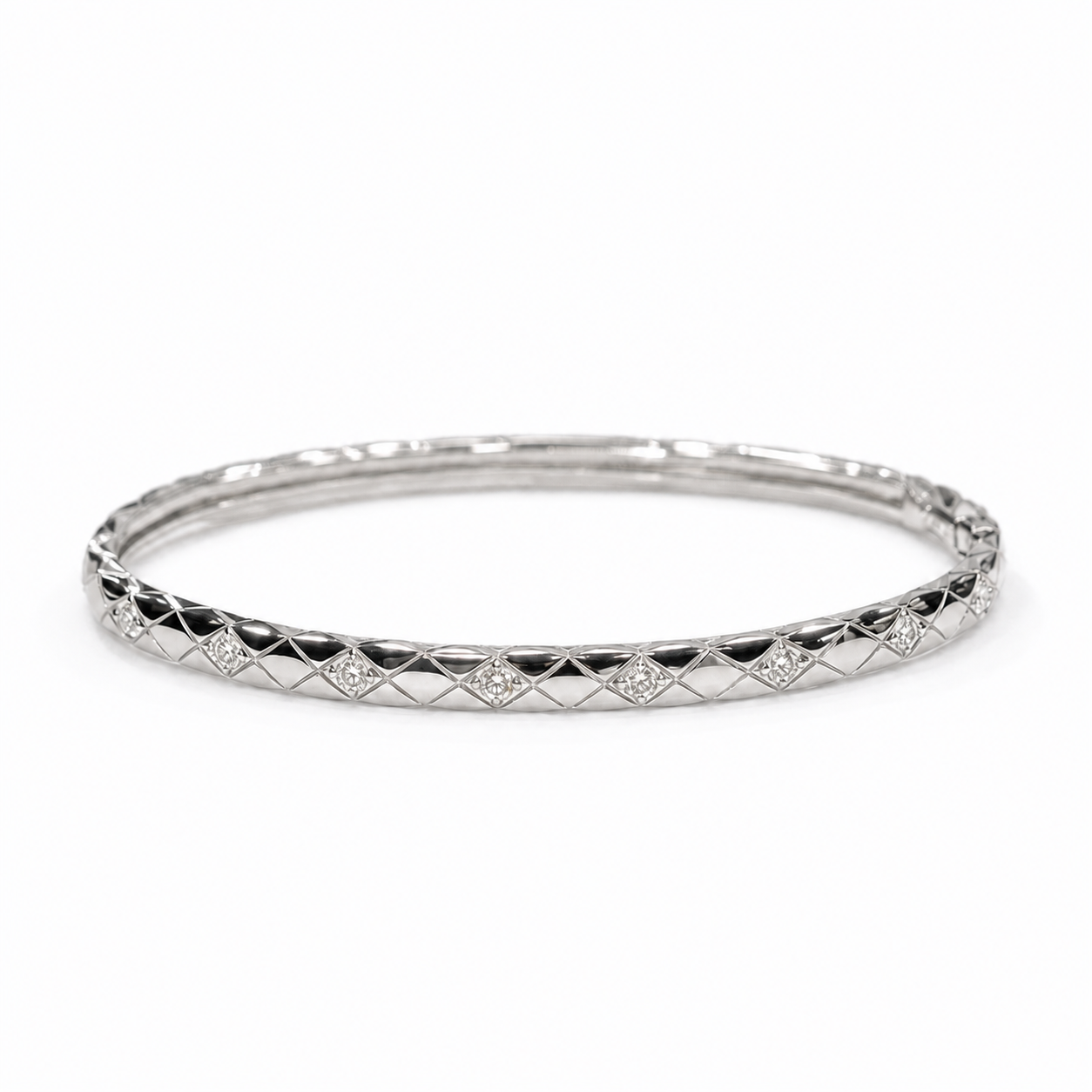 CHANEL COCO CRUSH mini diamond bracelet in 18K white gold on a neutral white background