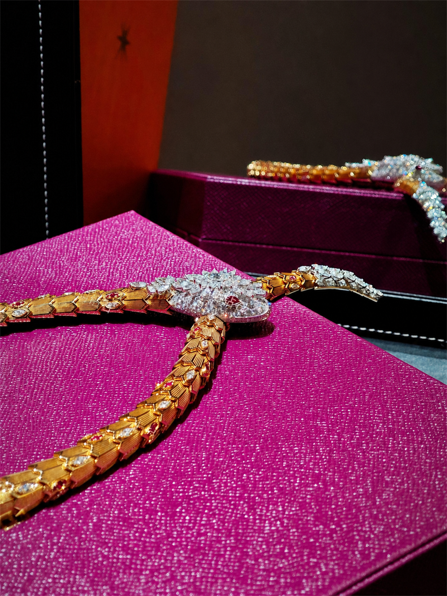 BVLGARI Serpenti high jewelry ruby and diamond lariat necklace, lariat detail on presentation case