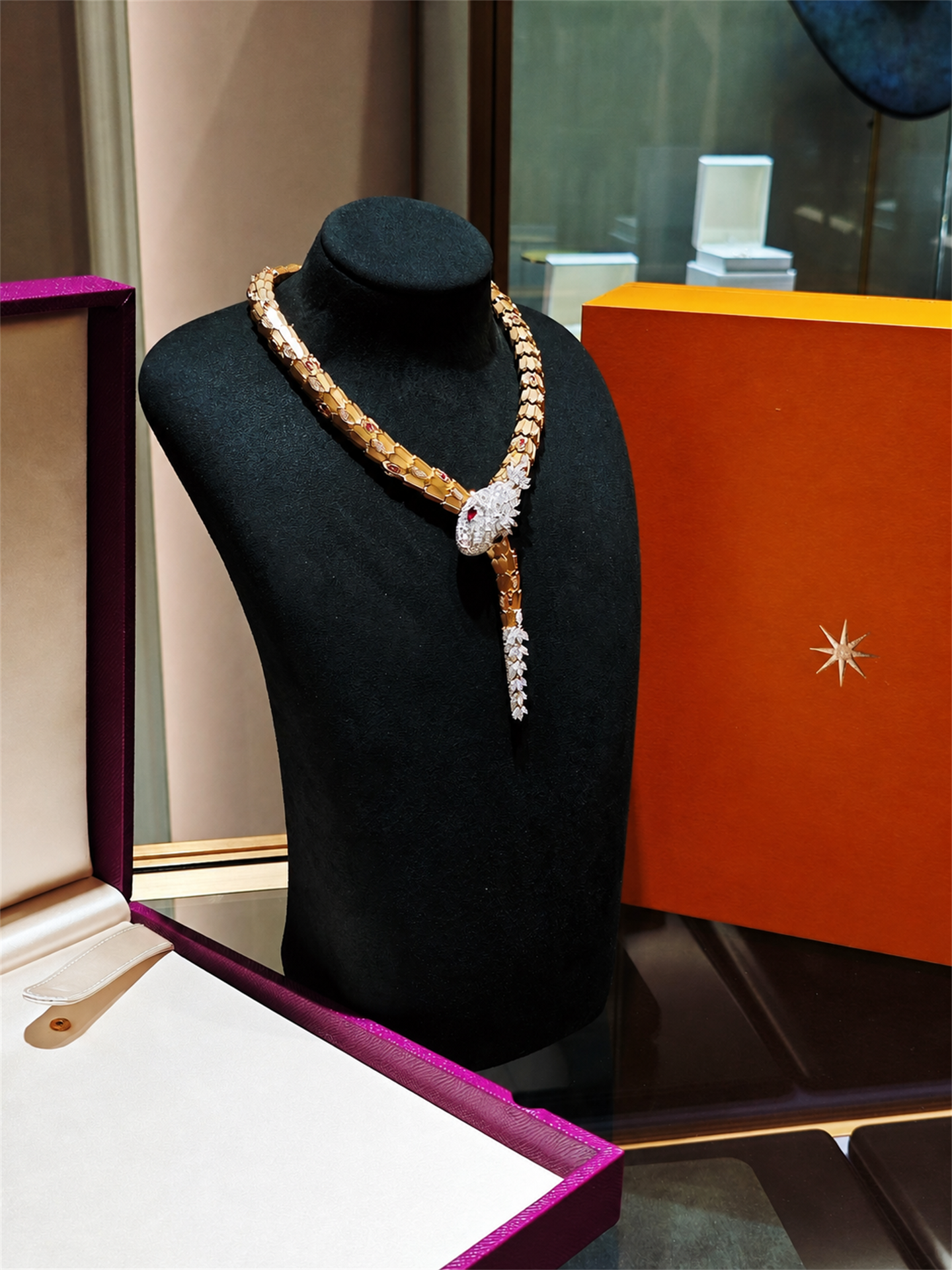 BVLGARI Serpenti high jewelry ruby and diamond lariat necklace, display bust view