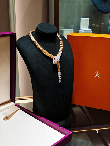 BVLGARI Serpenti high jewelry ruby and diamond lariat necklace, display bust view
