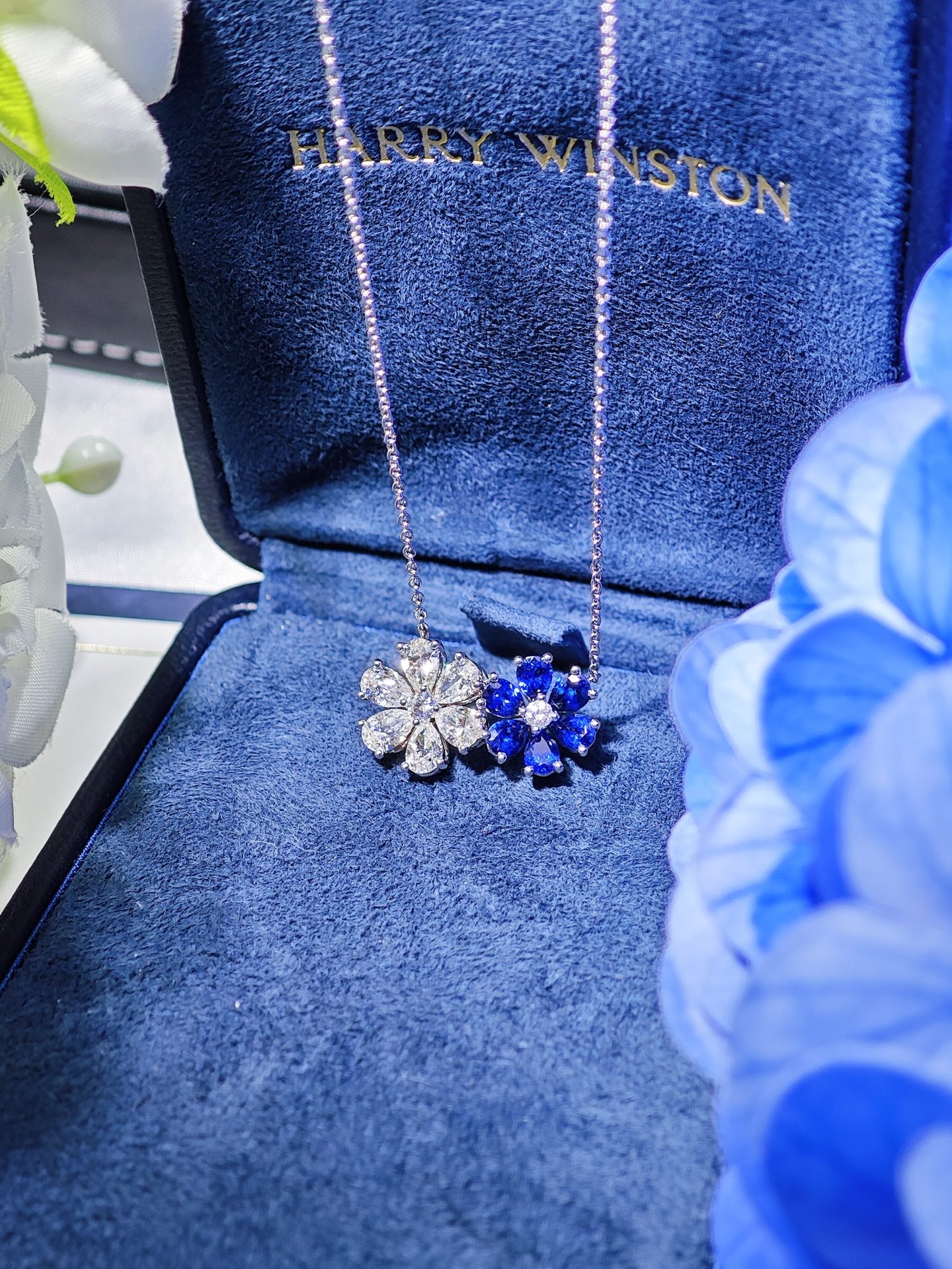 Harry Winston Forget-Me-Not sapphire and diamond twin pendant necklace detail