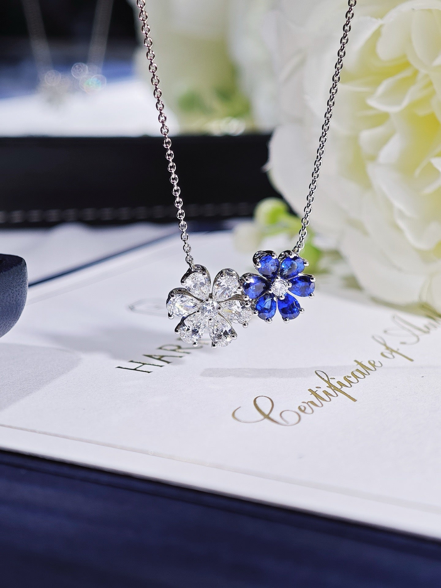 Harry Winston Forget-Me-Not sapphire and diamond twin pendant necklace front view