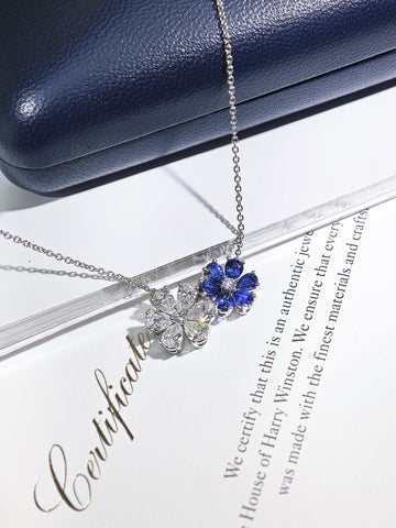 Harry Winston Forget-Me-Not sapphire and diamond twin pendant necklace close-up