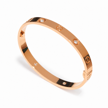 Cartier LOVE Bracelet, Classic Model, 4 Diamonds in 18K rose gold on a white background