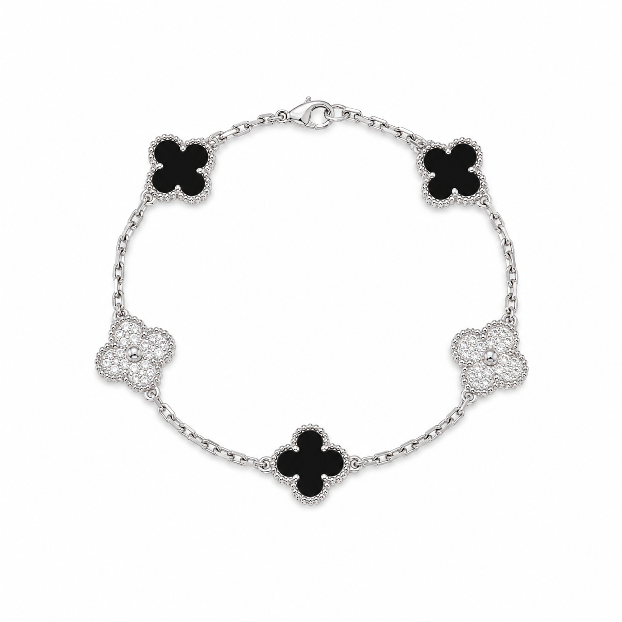 Van Cleef & Arpels Vintage Alhambra five-motif black onyx and diamond bracelet on white background