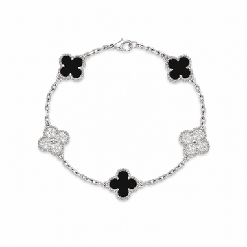 Van Cleef & Arpels Vintage Alhambra five-motif black onyx and diamond bracelet on white background