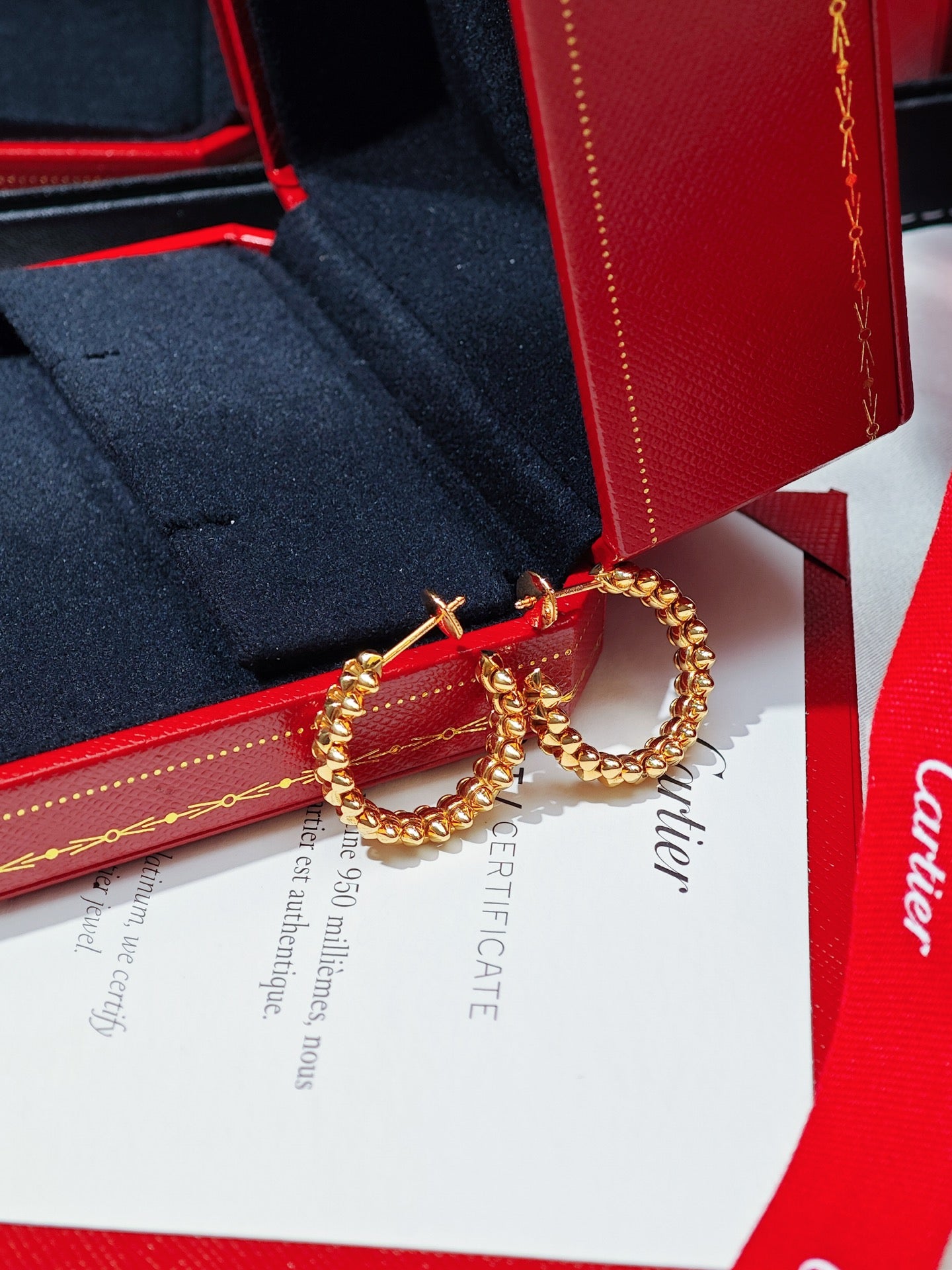 Cartier Clash de Cartier small-model hoop earrings in Cartier presentation-box context
