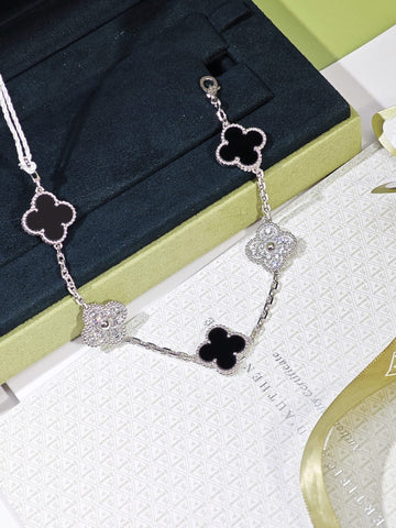 Van Cleef & Arpels Vintage Alhambra five-motif black onyx and diamond bracelet close detail