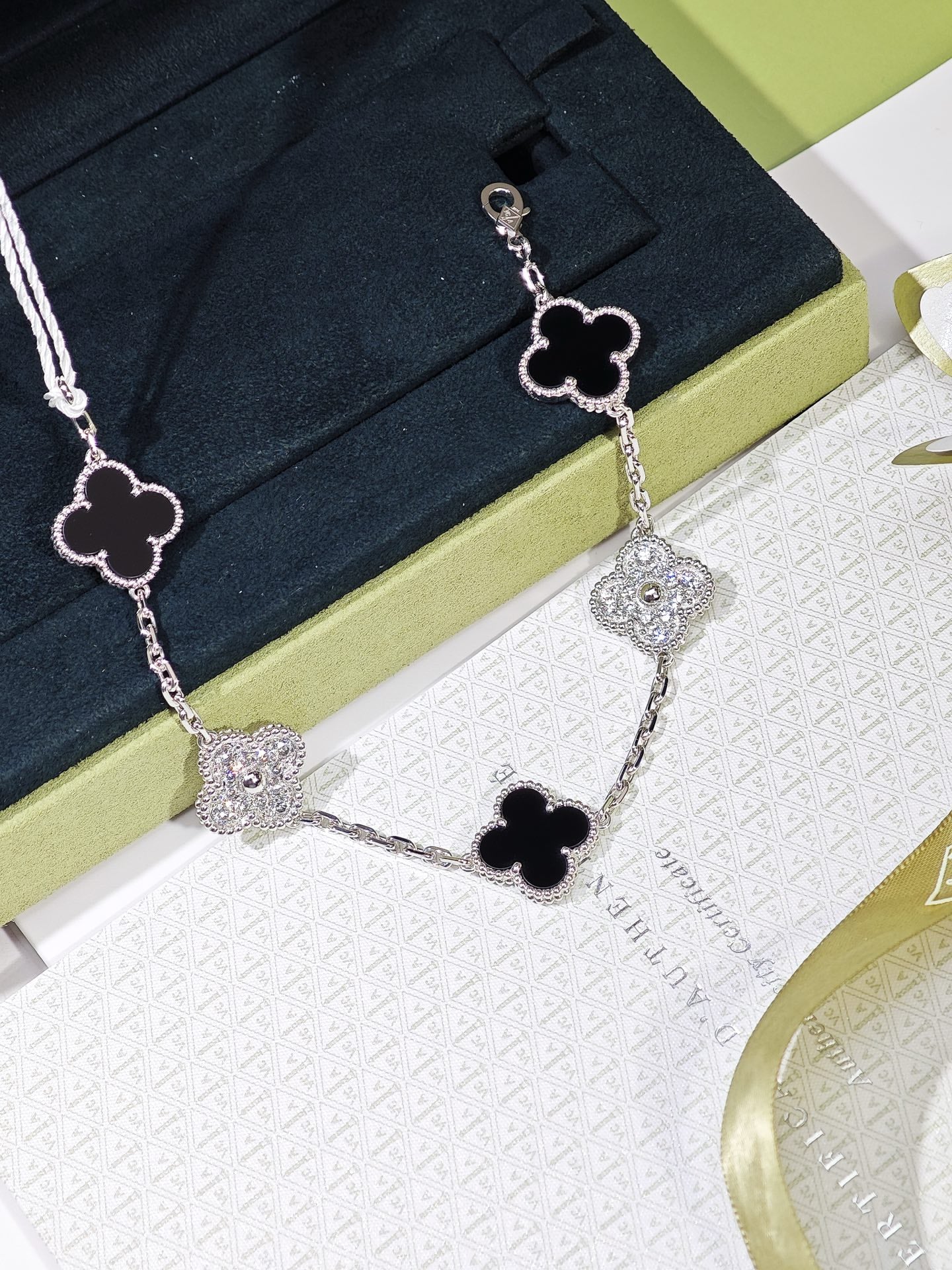 Van Cleef & Arpels Vintage Alhambra five-motif black onyx and diamond bracelet close detail